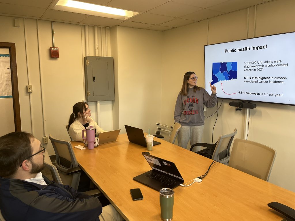 Lab members presenting research.